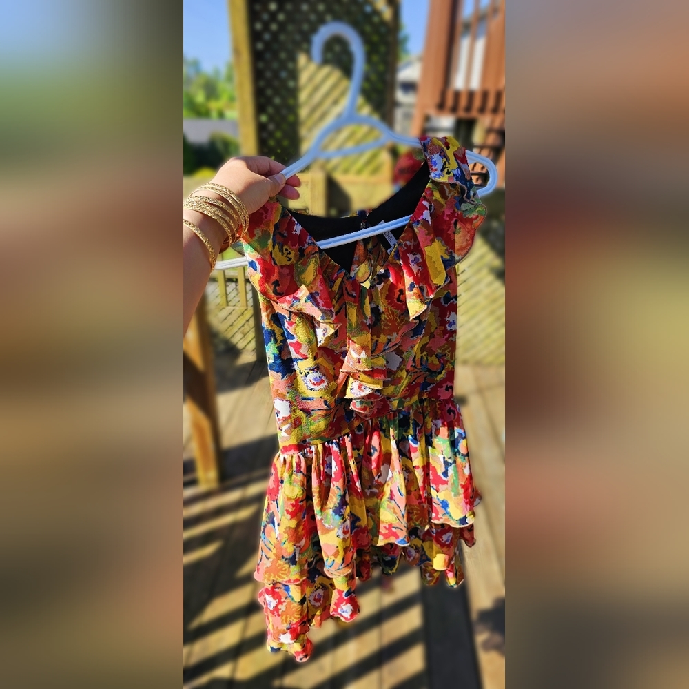 This beautiful Rachael Roy multi-colored dress can be worn on many occasions.